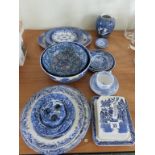 A quantity of blue and white china to include Copeland Spodes Italian, Willow pattern cheese dish