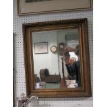 A gilt gesso framed wall mirror