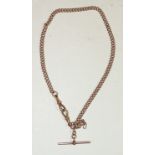 A 9ct rose gold double Albert chain, with gold T bar. 30.9g approx