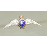 A 9ct gold and enamelled "Royal Flying Corp" sweethearts brooch, white enamelled wings with blue