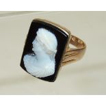 A Gents 9ct rose gold ring set with a large rectangular cameo depicting a Greek classical male bust,