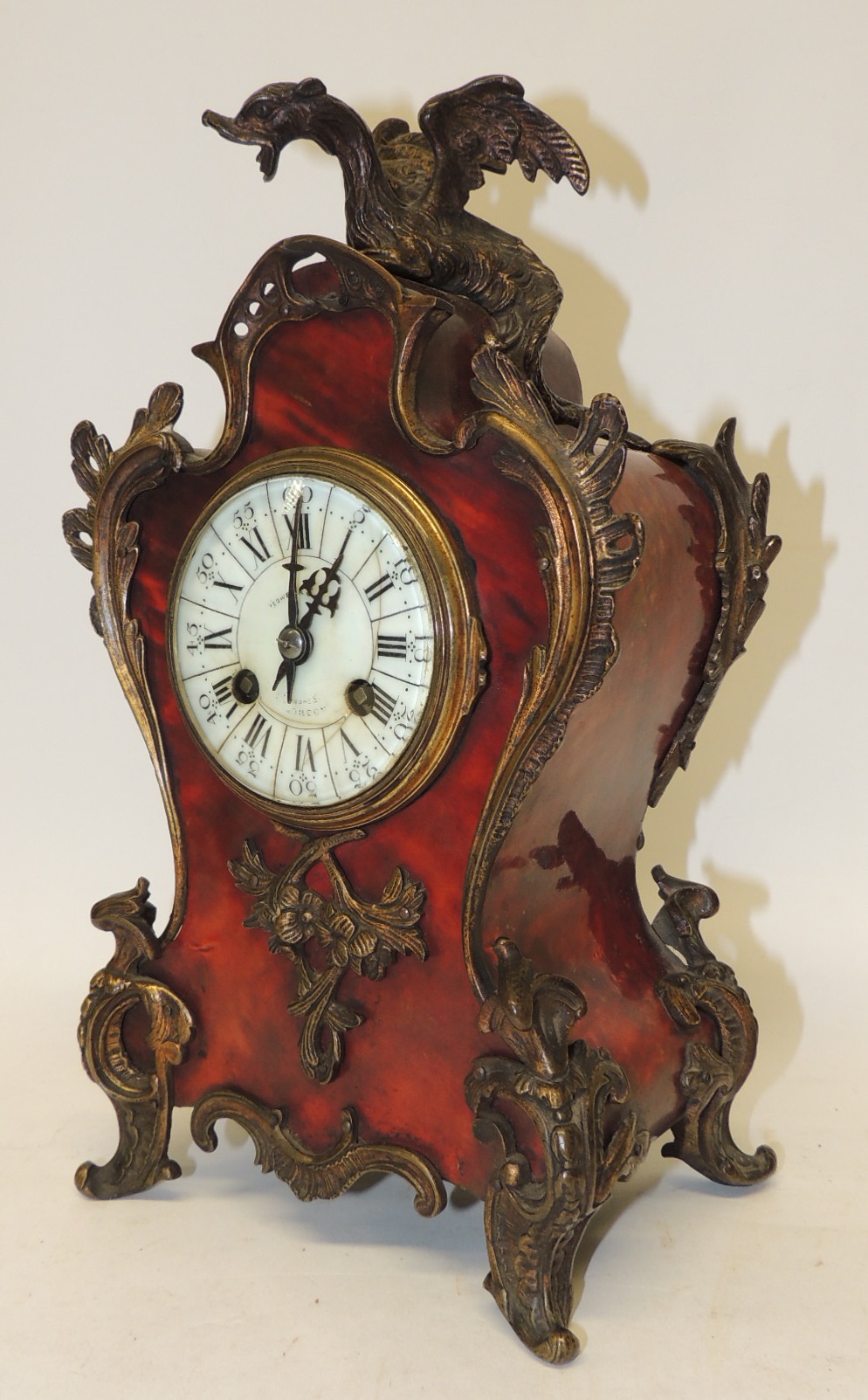 A late 19th Century French mantel clock by Mougin, having circular white enamel dial with black - Image 2 of 3