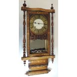 A Victorian wall clock in inlaid walnut rectangular case and having brass chapter ring, two train