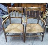 PAIR OF OAK OPEN ARMCHAIRS WITH SPLAT BACK & RUSHWORK SEAT ON TURNED SUPPORTS