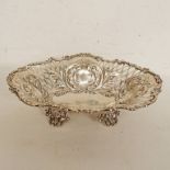 VICTORIAN SILVER DISH WITH PIERCED DECORATION ON FOUR FEET BY WILLIAM HUTTON & SONS, LONDON 1897