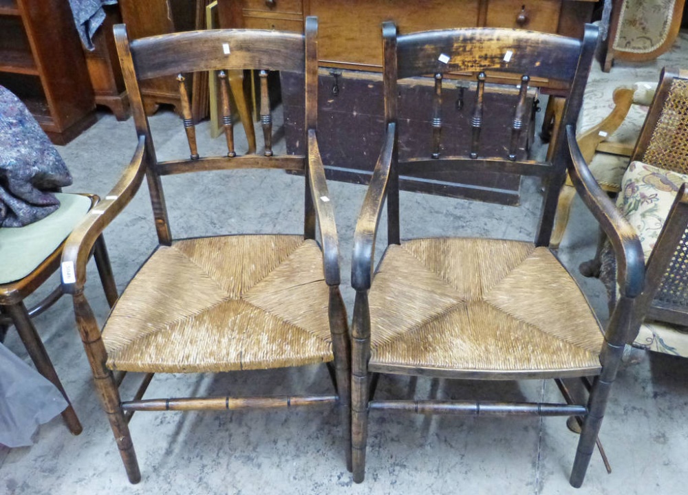 PAIR OF OAK OPEN ARMCHAIRS WITH SPLAT BACK & RUSHWORK SEAT ON TURNED SUPPORTS