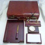 JACOB BROWN LEATHER BRIEFCASE AND WOODEN DESK SET.