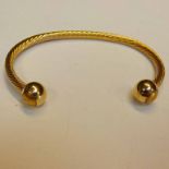 GILT METAL BANGLE