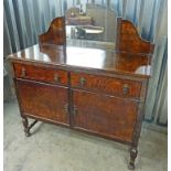 20TH CENTURY OAK MIRROR BACK SIDEBOARD WITH 2 DRAWERS OVER 2 PANEL DOORS ON TURNED SUPPORTS