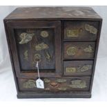 LATE 19TH CENTURY HARDWOOD EASTERN CABINET WITH 4 DRAWERS AND PANEL DOOR ALL WITH BRASS MOUNTS