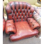 PAIR OF RED LEATHER BUTTON BACK ARMCHAIRS