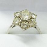 DIAMOND CLUSTER RING, THE PRINCIPAL BRILLIANT-CUT DIAMOND OF APPROX 0.70 CARATS & REMAINING DIAMONDS