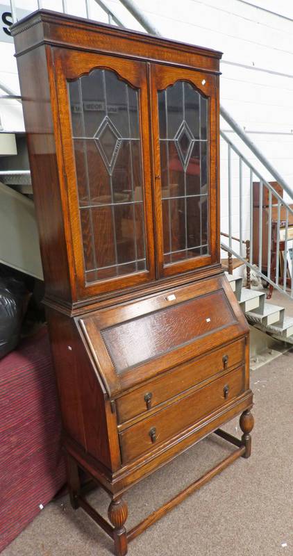 EARLY 20TH CENTURY OAK BUREAU BOOKCASE WITH 2 LEADED GLASS PANEL DOORS OVER FALL FRONT OVER 2