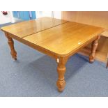 LATE 19TH CENTURY OAK WIND OUT DINING TABLE ON TURNED SUPPORTS WITH TURNED SUPPORTS