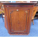 19TH CENTURY OAK & MAHOGANY WALL MOUNTED CORNER CABINET WITH PANEL DOOR