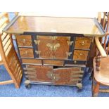 ORIENTAL HARDWOOD SIDE CABINET WITH PANEL DOORS ON SHAPED SUPPORTS