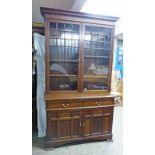19TH CENTURY EARLY 20TH CENTURY MAHOGANY BOOKCASE WITH 2 ASTRAGLED GLASS DOORS OPENING TO SHELVES