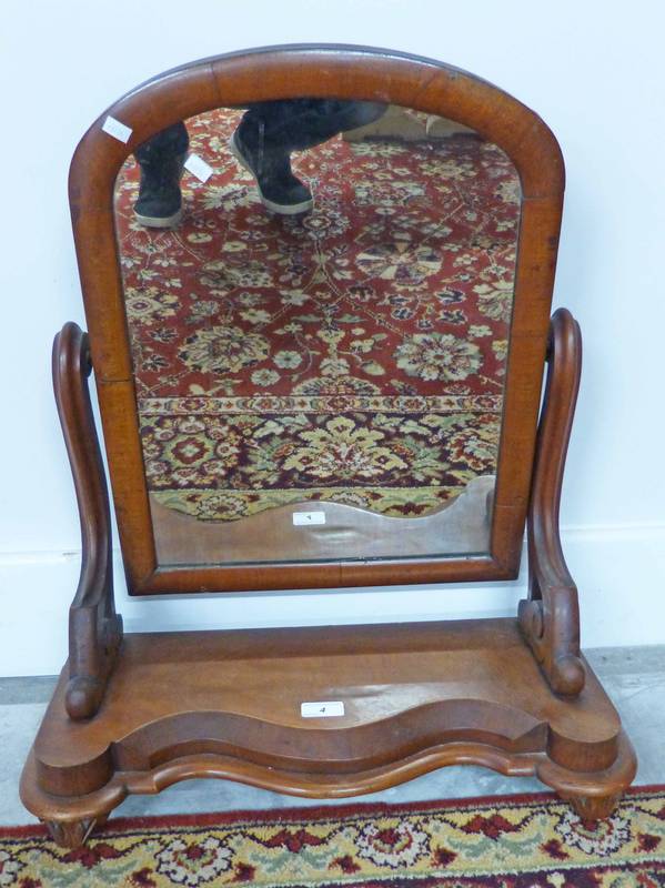 20TH CENTURY MAHOGANY FRAMED DRESSING MIRROR WITH SHAPED FRONT ON BUN FEET