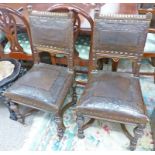 PAIR OF 19TH CENTURY WALNUT HALL CHAIRS WITH DECORATIVE EMBOSSED LEATHER SEATS & BACKS ON TURNED