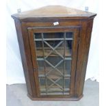 19TH CENTURY MAHOGANY CORNER CABINET WITH ASTRAGAL GLASS PANEL DOOR