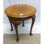 CIRCULAR TOPPED MAHOGANY TABLE ON 4 SHAPED SUPPORTS