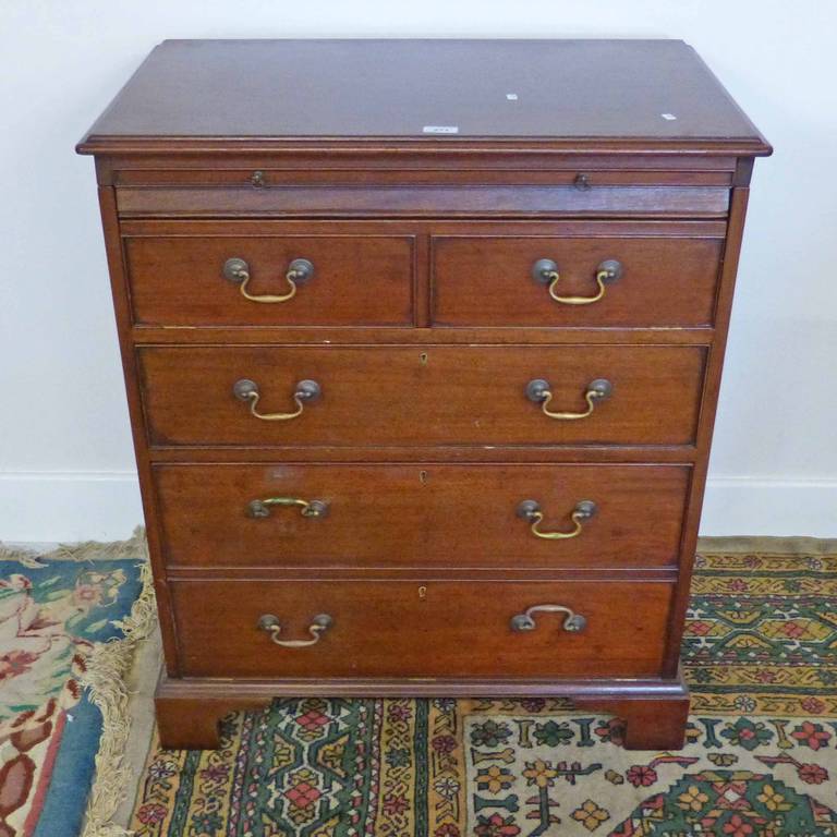 20TH CENTURY MAHOGANY MUSIC CABINET SHAPED AS A CHEST OF DRAWERS & A WINE TABLE