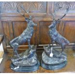 PAIR BRONZE STAGS ON A ROCKY OUTCROP ON HARDSTONE PLINTH 74CM TALL