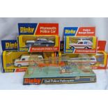 SELECTION OF DINKY TOYS: 244- PLYMOUTH POLICE CAR, 269-FORD TRANSIT POLICE ACCIDENT UNIT, 254-POLICE