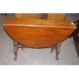 19TH CENTURY MAHOGANY SUTHERLAND TABLE WITH CARVED SPREADING SUPPORTS