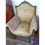 LATE 19TH CENTURY CARVED MAHOGANY FRAMED OVERSTUFFED ARMCHAIR ON SHAPED SUPPORTS,