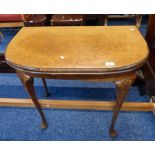 EARLY 20TH CENTURY BOW FRONT WALNUT TURN OVER CARD TABLE ON QUEEN ANNE SUPPORTS