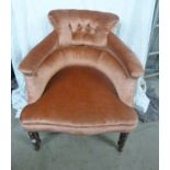 LATE 19TH CENTURY BUTTON BACK TUB CHAIR ON TURNED SUPPORTS