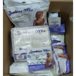 BOX CONTAINING 'BAMBINO MIO' NAPPIES AND ASSOCIATED ITEMS