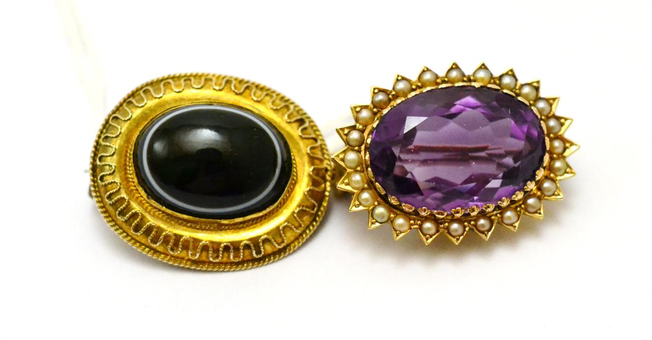 # An amethyst and seed pearl cluster brooch, measures 2.9cm by 2.3cm and an oval sardonyx set