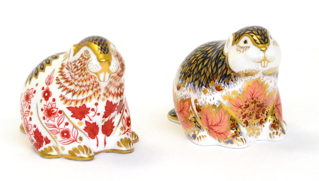 Two Royal Crown Derby paperweights including: Riverbank Beaver (gold stopper) and Beaver (silver