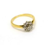 An 18ct gold diamond cluster ring