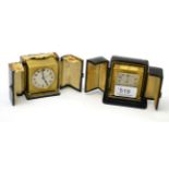 Two gilt metal travelling alarm timepieces, signed Zenith