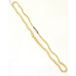 A cultured pearl necklace, the graduated pearls strung to a diamond set clasp, length 52cm The