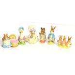 Beswick Beatrix Potter figures comprising: Flopsy, Mopsy and Cottontail, style one; Hunca Munca,
