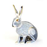 A Royal Crown Derby Paperweight, Starlight Hare (gold stopper) together with a collectors guideIn