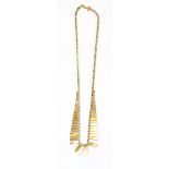 A 9ct gold three colour Cleopatra necklace