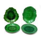 A group of four majolica plates, all 19th century including Wedgwood