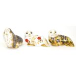 Three Royal Crown Derby paperweights including: Russian Walrus (gold stopper), Seal (silver stopper)