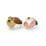 Two Royal Crown Derby paperweights including: Dappled Quail and Quail (each with gold stopper)Both
