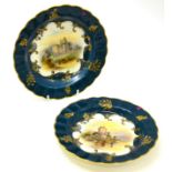 Pair of Royal Worcester plates, hand decorated with views of Ross Castle and Brougham Castle, signed
