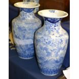 A pair of Oriental blue and white baluster vases (a.f.)