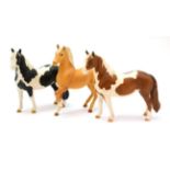 Beswick Horses comprising: Pinto Pony, model No. 1373, second version, skewbald matt; another,