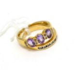 A diamond half hoop ring, stamped '14K' and a 9ct gold amethyst and diamond ring (2)