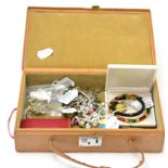 A box containing assorted jewellery, including a Scottish brooch with Celtic symbols, a diamond