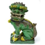 A 19th century Chinese porcelain temple lion, enamelled in green and yellow
